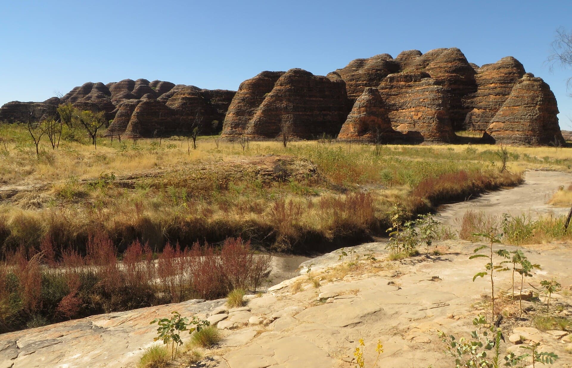 Banded orange-and-grey Bungle Bungle sandstone domes in Purnululu National Park, East Kimberley.